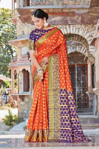 Grab This Pretty Elegant Looking Designer Saree In With Contrasting Colored Blouse. This Saree And Blouse Are Handloom Silk Based Beautified With Wevon Jari Jacquard And Stone Work. Buy Now.