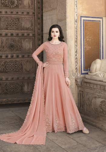 Grab This Heavy Designer Floor Length Suit Is In Attractive Pastel Salmon Color. Its Heavy Embroidered Top Is Fabricated On Soft Georgette Paired With Dull Santoon Bottom And Soft Georgette Fabricated Dupatta. Buy This Lovely Embroidered Floor Length Suit Now