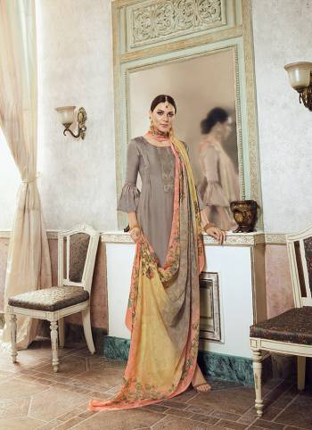 Simple And Elegant Designer Suit Is Here In Embroidery Work with Digital Prints With Mukeish Work In Dupatta. This Suit Is In All Over Base Color Whose Top Is Satin Georgette Based Paired With Santoon Bottom And Brasso Fabricated Dupatta. 