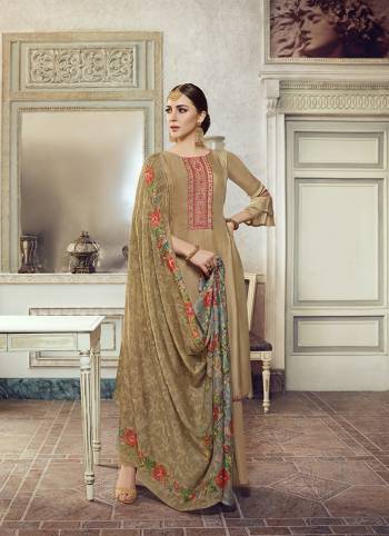 Simple And Elegant Designer Suit Is Here In Embroidery Work with Digital Prints With Mukeish Work In Dupatta. This Suit Is In All Over Base Color Whose Top Is Satin Georgette Based Paired With Santoon Bottom And Brasso Fabricated Dupatta. 