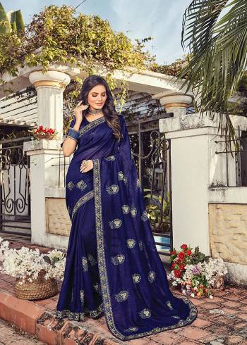 Celebrate This Festive Season In This Very Pretty Designer Saree Paired With Blouse. This Saree Vichitra Silk and Blouse Are Silk Based Beautified With Detailed Embroidery. 