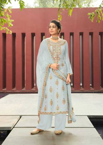 Look Pretty This In This Designer Straight Suit In Light Color. This Beautiful Dress Material Is Fabricated On Silk Minakari Jacquard Paired With Santoon Bottom And Chiffon Fabricated Dupatta With Embroidery. Buy Now. 