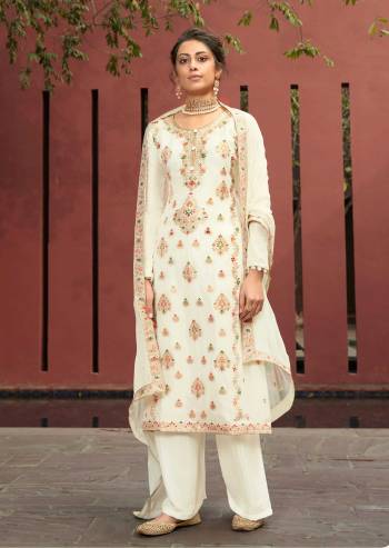 Look Pretty This In This Designer Straight Suit In Light Color. This Beautiful Dress Material Is Fabricated On Silk Minakari Jacquard Paired With Santoon Bottom And Chiffon Fabricated Dupatta With Embroidery. Buy Now. 