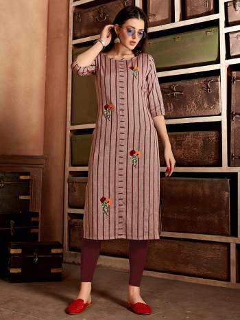 Grab This Readymade Long Kurti In Fine Color Fabricated On Wevon Design Cotton Beautified With Hand Embroidery Work. It Is Light In Weight And Easy To Carry All Day Long. 