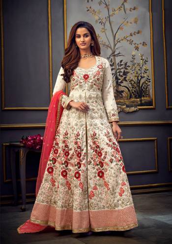 Add This Very Pretty Heavy Designer Floor Length Suit To Your Wardrobe In All Over Color. Its Heavy Embroidered And Swaroski Top IS Fabricated On Silk Paired With Santoon Bottom And Net Fabricated Dupatta. It Is Light In Weight And Easy To Carry Throughout The Gala. Buy Now. 

