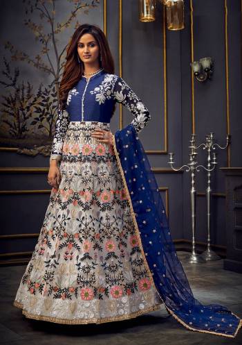 Add This Very Pretty Heavy Designer Floor Length Suit To Your Wardrobe In All Over Color. Its Heavy Embroidered And Swaroski Top IS Fabricated On Butterfly Net Paired With Santoon Bottom And Net Fabricated Dupatta. It Is Light In Weight And Easy To Carry Throughout The Gala. Buy Now. 

