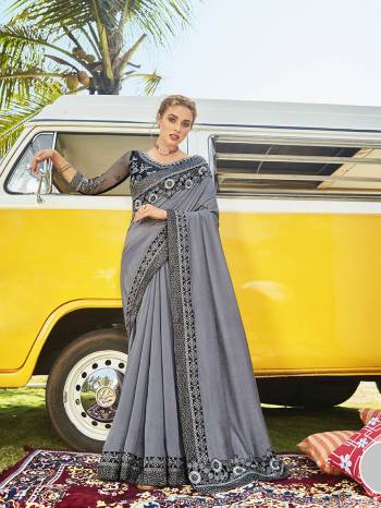 Celebrate This Festive Season In This Very Pretty Colored Designer Saree Paired With Maching Colored Blouse. This Saree Vichitra Silk and Blouse Art Silk Based Beautified With Detailed Embroidery Lace Border And Blouse Work. 