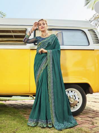 Celebrate This Festive Season In This Very Pretty Colored Designer Saree Paired With Maching Colored Blouse. This Saree Vichitra Silk and Blouse Art Silk Based Beautified With Detailed Embroidery Lace Border And Blouse Work. 