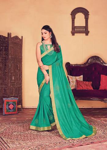 Celebrate This Festive Season In This Saree Paired with Blouse. This Saree Are Vichitra Silk and Blouse Are Jacquard Based Beautified With Detailed Swaroski Butta In Saree. 