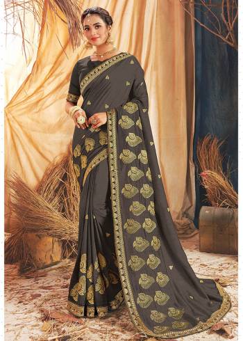 Grab This Pretty Elegant Looking Designer Saree In Dusty Color Paired With Canecting Colored Blouse. This Saree Vichitra Silk And Blouse Are Vichitra Silk Based Beautified With Embroidery Saree And Border. Buy Now.