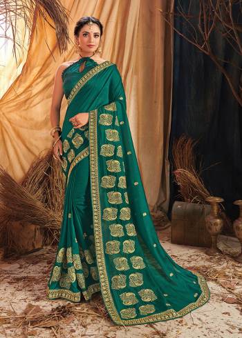 Grab This Pretty Elegant Looking Designer Saree In Dusty Color Paired With Canecting Colored Blouse. This Saree Vichitra Silk And Blouse Are Vichitra Silk Based Beautified With Embroidery Saree And Border. Buy Now.