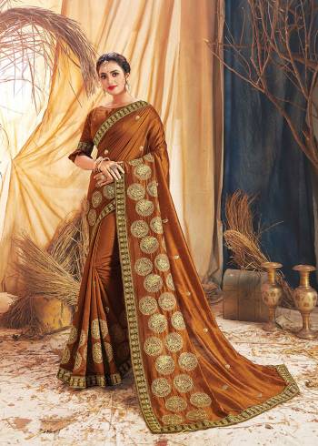 Grab This Pretty Elegant Looking Designer Saree In Dusty Color Paired With Canecting Colored Blouse. This Saree Vichitra Silk And Blouse Are Vichitra Silk Based Beautified With Embroidery Saree And Border. Buy Now.