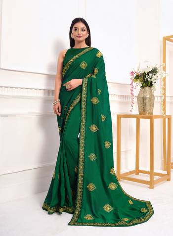 Adorn The Pretty Angelic Look Wearing This Heavy Designer Embroidery Butta Saree In Dark Color Paired With Blouse. This Saree Is Fabricated On Vichitra Silk Paired With Art Silk Fabricated Blouse. Its Pretty Color Pallete Will Give An Attractive Look To Your Personality. 