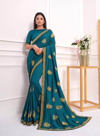 Adorn The Pretty Angelic Look Wearing This Heavy Designer Embroidery Butta Saree In Dark Color Paired With Blouse. This Saree Is Fabricated On Vichitra Silk Paired With Art Silk Fabricated Blouse. Its Pretty Color Pallete Will Give An Attractive Look To Your Personality. 