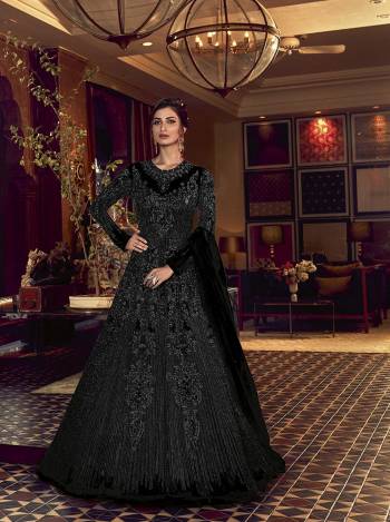 Grab This Very Beautiful Heavy Designer Floor Length Suit In Fine Color. Its Top Is Fabricated On Butterfly Net Paired With Soft Silk Bottom and Butterfly Net Fabricated Dupatta. It Is Beautified With Tone To Tone Embroidery All Over. Buy Now. 

