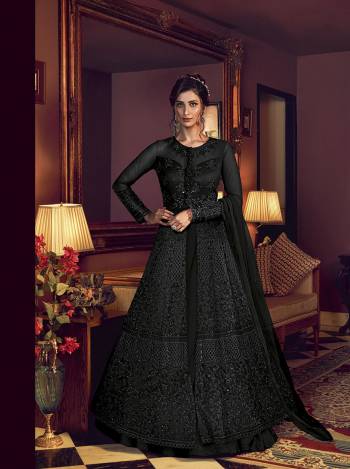 Grab This Very Beautiful Heavy Designer Floor Length Suit In Fine Color. Its Top Is Fabricated On Butterfly Net Paired With Banglori Silk Bottom and Butterfly Net Fabricated Dupatta. It Is Beautified With Tone To Tone Embroidery All Over. Buy Now. 

