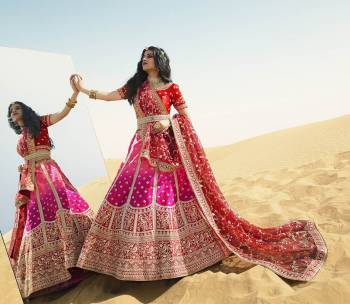 Heavy Designer Lehenga Choli In Attrective Color Fabricated On Satn Silk Beautified With Heavy Attractive Embroidery And Stone Work And Dupatta Are Net  With Belt And Matching Latkan. 