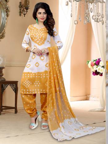 Simple Dress Material Is Here For Your Casual Wear In Bandhej Printed Top Paired With Contrasting Colored Bottom And Dupatta. Its Top Is Fabricated On Cotton Paired With Cotton Bottom And Cotton Dupatta. Its Fabric Is Durable And Easy To Care For. 

