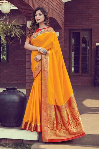 Look Attractive Wearing This Dark Colored Saree Paired With Contrasted Colored Blouse.  This Heavy Designer Jari Jacquard Wevon Saree Is Silk Based Which Gives A Rich Look To Your Personality. Buy This Pretty Saree Now.