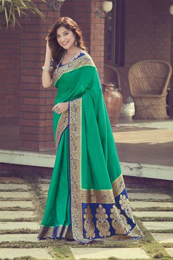 Look Attractive Wearing This Dark Colored Saree Paired With Contrasted Colored Blouse.  This Heavy Designer Jari Jacquard Wevon Saree Is Silk Based Which Gives A Rich Look To Your Personality. Buy This Pretty Saree Now.