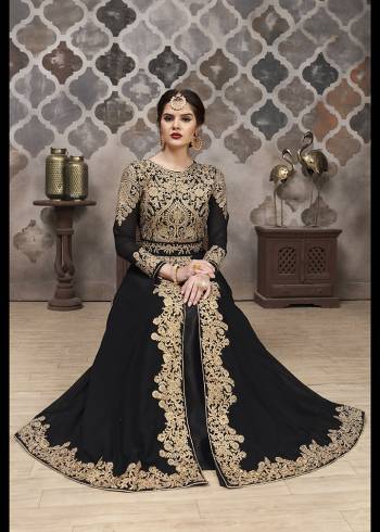 Here Is A Very Pretty Designer Indo-Western Suit In Dark Colored Top, Bottom, Dupatta. Its Heavy Embroidered And Stone Work Top Is Fabricated On Faux Georgette Paired With Santoon Bottom And Chiffon Fabricated Dupaata. Buy This Lehenga Suit Now. 