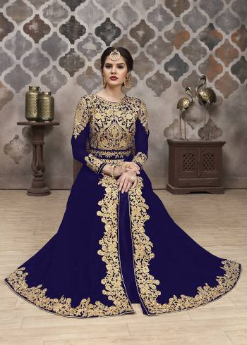 Here Is A Very Pretty Designer Indo-Western Suit In Dark Colored Top, Bottom, Dupatta. Its Heavy Embroidered And Stone Work Top Is Fabricated On Faux Georgette Paired With Santoon Bottom And Chiffon Fabricated Dupaata. Buy This Lehenga Suit Now. 