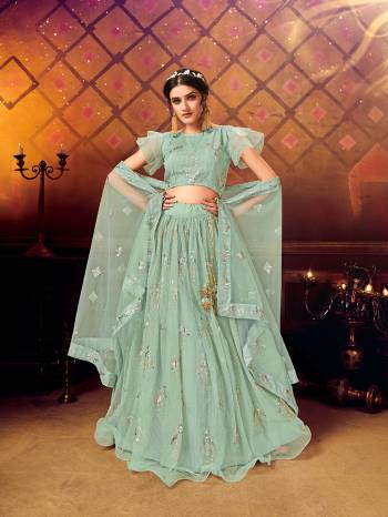 Here Is A Very Pretty Heavy Designer Lehenga Choli For The Bridesmaid In This Lovely Color. This Detailed Embroidered Lehenga Choli And Dupatta Are Fabricated On Soft Net Which Is Light Weight, Durable And Gives A Pretty Look The Personality. Buy This Pretty Piece Now. 

