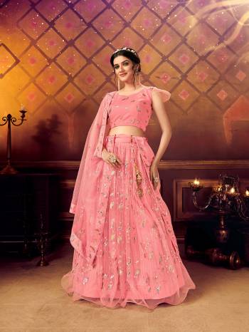 Here Is A Very Pretty Heavy Designer Lehenga Choli For The Bridesmaid In This Lovely Color. This Detailed Embroidered Lehenga Choli And Dupatta Are Fabricated On Soft Net Which Is Light Weight, Durable And Gives A Pretty Look The Personality. Buy This Pretty Piece Now. 

