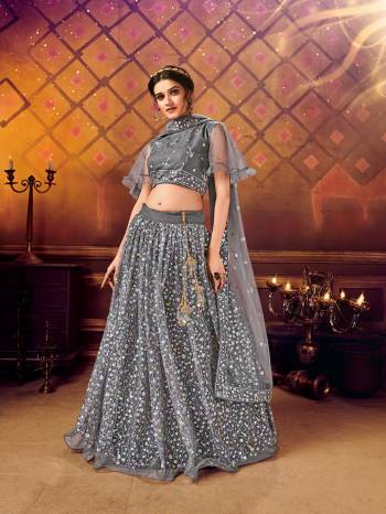 Here Is A Very Pretty Heavy Designer Lehenga Choli For The Bridesmaid In This Lovely Color. This Detailed Embroidered Lehenga Choli And Dupatta Are Fabricated On Soft Net Which Is Light Weight, Durable And Gives A Pretty Look The Personality. Buy This Pretty Piece Now. 

