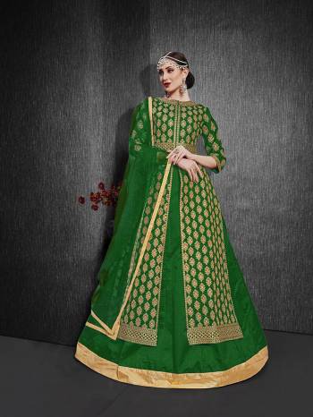 Here Is A Royal Looking Heavy Designer Floor Length Suit In Green Color. Its Heavy Embroidered Top Is Fabricated On Heavy Silk Paired With Santoon Fabricated Bottom And Net Fabricated Dupatta. Its Royal Color and Pattern Will Earn You Lots Of Compliments From Onlookers. 

