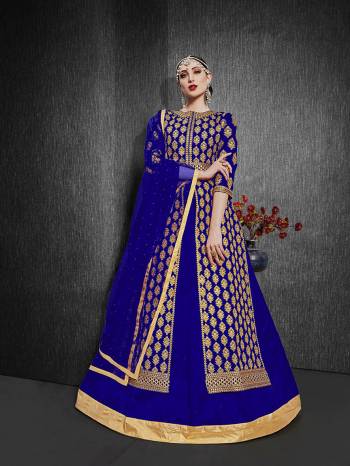 Here Is A Royal Looking Heavy Designer Floor Length Suit In Nevy Blue Color. Its Heavy Embroidered Top Is Fabricated On Heavy Silk Paired With Santoon Fabricated Bottom And Net Fabricated Dupatta. Its Royal Color and Pattern Will Earn You Lots Of Compliments From Onlookers. 

