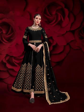 Here Is A Royal Looking Heavy Designer Floor Length Suit In Black Color. Its Heavy Embroidered Top Is Fabricated On Georgette Paired With Santoon Fabricated Bottom And Net Fabricated Dupatta. Its Royal Color and Pattern Will Earn You Lots Of Compliments From Onlookers. 

