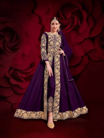 Here Is A Royal Looking Heavy Designer Floor Length Suit In Wine Color. Its Heavy Embroidered Top Is Fabricated On Heavy Silk Paired With Santoon Fabricated Bottom And Net Fabricated Dupatta. Its Royal Color and Pattern Will Earn You Lots Of Compliments From Onlookers. 

