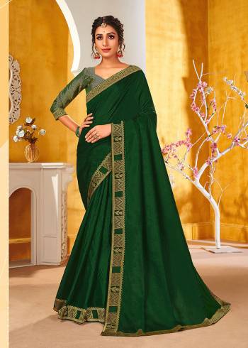 Adorn The Pretty Angelic Look Wearing This Designer Broket Border And Blouse Saree In Green Color Paired With Green Colored Blouse. This Saree Is Fabricated On Vichitra Silk Paired With Broket Fabricated Blouse. Its Pretty Color Pallete Will Give An Attractive Look To Your Personality. 