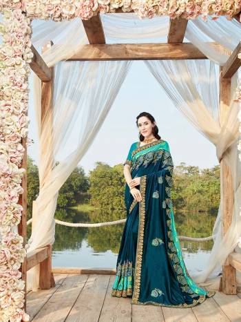 Celebrate This Festive Season In This Very Pretty Colored Designer Cut Peach Saree Paired With Contrasting Colored Blouse. This Saree and Blouse Blooming Vichitra With Viscose  Based Beautified With Detailed Embroidery. 