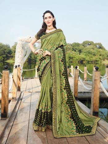 Celebrate This Festive Season In This Very Pretty Colored Designer Cut Peach Saree Paired With Contrasting Colored Blouse. This Saree and Blouse Blooming Vichitra With Viscose  Based Beautified With Detailed Embroidery. 