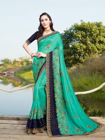 Celebrate This Festive Season In This Very Pretty Colored Designer Cut Peach Saree Paired With Contrasting Colored Blouse. This Saree and Blouse Blooming Vichitra With Viscose  Based Beautified With Detailed Embroidery. 