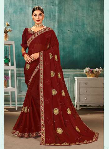 Grab This Pretty Elegant Looking Designer Saree In Fine Color Paired With Maching Colored Blouse. This Saree Are Sahi Chiffon And Blouse Are Art Silk Based Beautified With Embroidery Butta And Embroidery Lace Border. Buy Now.