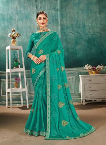 Grab This Pretty Elegant Looking Designer Saree In Fine Color Paired With Maching Colored Blouse. This Saree Are Sahi Chiffon And Blouse Are Art Silk Based Beautified With Embroidery Butta And Embroidery Lace Border. Buy Now.