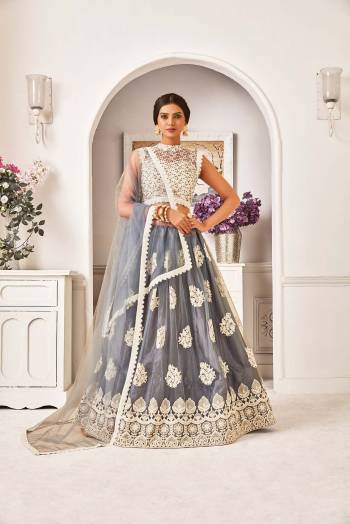 This Very Pretty Designer Lehenga Choli In Fine Color Fabricated On Mono Net With Thread,Jari,Sequance Work. Its Dupatta IS Fabricated On Mono Net Beautified  Work And Lace Border. Buy This Lehenga Choli Now. 

