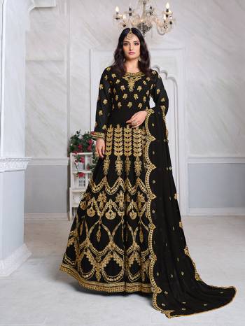 Look Pretty This Designer Floor Length Suit In Lovely Black Color.?Its Pretty Heavy Jari Embroidred Top Is Faux Georgette Based Paired With Santoon Bottom And Faux Georgette Fabricated Embroidered Dupatta Which Gives An Attractive To The Suit.