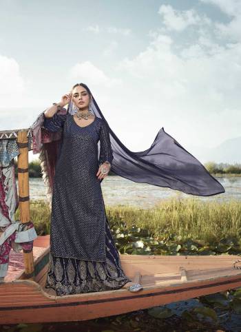 Attract All Wearing This Designer Suit In Nevy Blue Color. Its Pretty Top Is Fabricated On Georgette Paired With Georgette Fabricated Bottom and Net Dupatta. This Suit's Top, Bottom And Dupatta Are Beautified With Detailed Heavy Embroidery. Buy This Pretty Piece Now.