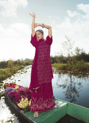 Attract All Wearing This Designer Suit In Burgundy Color. Its Pretty Top Is Fabricated On Georgette Paired With Georgette Fabricated Bottom and Net Dupatta. This Suit's Top, Bottom And Dupatta Are Beautified With Detailed Heavy Embroidery. Buy This Pretty Piece Now.