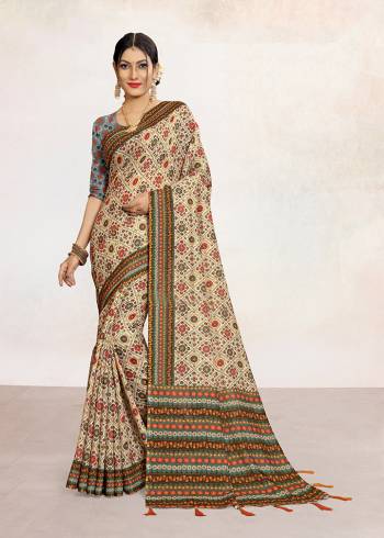 Look Attractive Wearing This Colored Saree Paired With Contrsted Colored Blouse.  This Printed Saree Is Linen Based Which Gives A Rich Look To Your Personality. Buy This Pretty Saree Now.