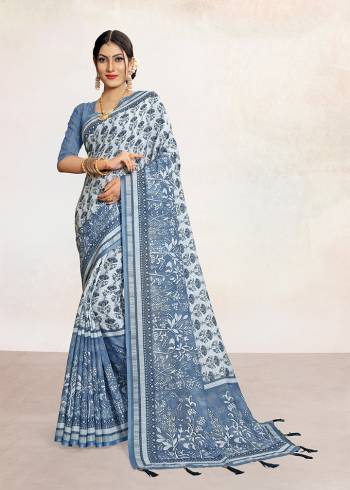 Look Attractive Wearing This Colored Saree Paired With Contrsted Colored Blouse.  This Printed Saree Is Linen Based Which Gives A Rich Look To Your Personality. Buy This Pretty Saree Now.