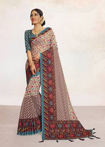 Look Attractive Wearing This Colored Saree Paired With Contrsted Colored Blouse.  This Printed Saree Is Linen Based Which Gives A Rich Look To Your Personality. Buy This Pretty Saree Now.