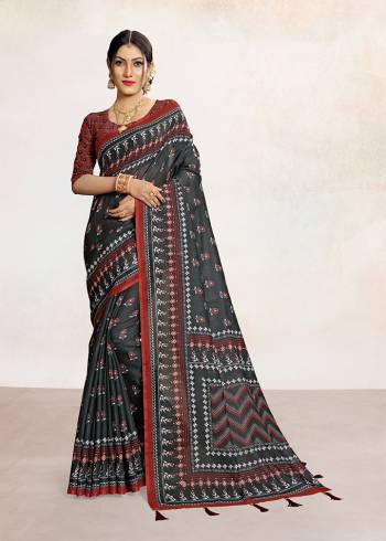 Look Attractive Wearing This Colored Saree Paired With Contrsted Colored Blouse.  This Printed Saree Is Linen Based Which Gives A Rich Look To Your Personality. Buy This Pretty Saree Now.