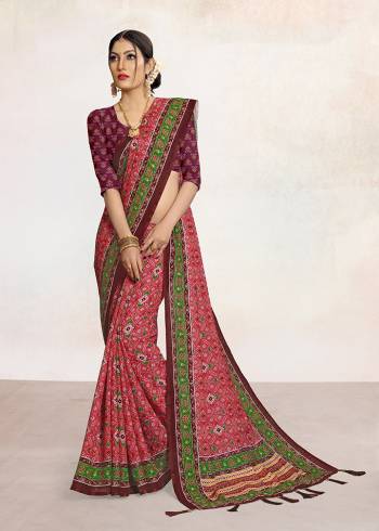 Look Attractive Wearing This Colored Saree Paired With Contrsted Colored Blouse.  This Printed Saree Is Linen Based Which Gives A Rich Look To Your Personality. Buy This Pretty Saree Now.