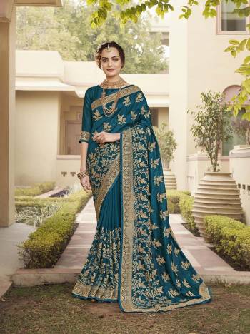 Celebrate This Festive Season In This Very Pretty Cobalt Blue Colored Designer Saree Paired With Blouse. This Saree and Blouse Are Vichitra Silk Based Beautified With Detailed Heavy Embroidery And Diamond Work. 