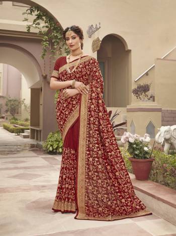 Celebrate This Festive Season In This Very Pretty Rust Red Colored Designer Saree Paired With Blouse. This Saree and Blouse Are Vichitra Silk Based Beautified With Detailed Heavy Embroidery And Diamond Work. 